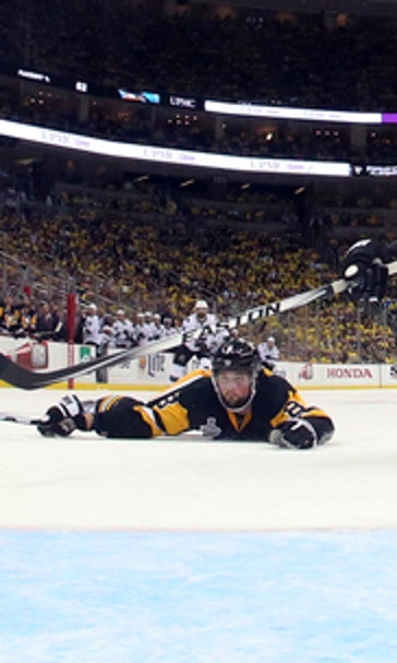 The Latest: Dumoulin draws penalty, give Penguins 1-0 lead